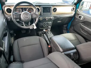 2019 Jeep Wrangler Unlimited Sport S with VIN 1C4HJXDG0KW602803, listed as a Copart auction lot 55640145 with 64,906 mi miles and Salvage title. Bid and sale history available at DreamBid. Image 8.