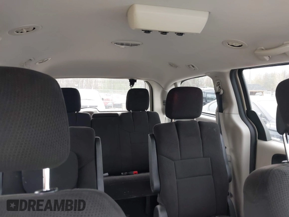2012 Dodge Grand Caravan SE with VIN 2C4RDGBG4CR298996, listed as a IAAI auction lot 42133423 with 70,354 mi miles and . Bid and sale history available at DreamBid. Image 8.