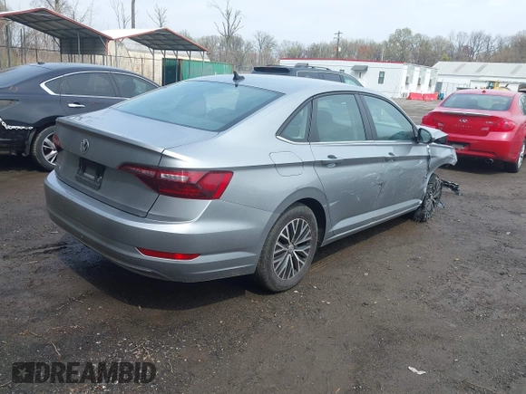 2021 Volkswagen Jetta S z VIN 3VWC57BUXMM048600, wystawiony jako IAAI lot #41956222 z przebiegiem 59 870 mil mil oraz . Historia ofert i sprzedaży dostępna na DreamBid. Obrazek 4.