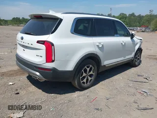 2020 Kia Telluride EX with VIN 5XYP34HC5LG008668, listed as a IAAI auction lot 42063077 with 59,480 mi miles and . Bid and sale history available at DreamBid. Image 4.