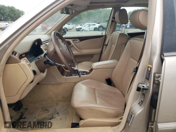 2001 Mercedes-Benz E-Class with VIN WDBJF65J01B389296, listed as a Copart auction lot 71933404 with 124,392 mi miles and Salvage Title. Bid and sale history available at carsss.com. Image 7.