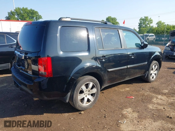 2013 Honda Pilot Touring z VIN 5FNYF4H96DB084148, wystawiony jako IAAI lot #42465066 z przebiegiem 220 339 mil mil oraz . Historia ofert i sprzedaży dostępna na DreamBid. Obrazek 4.