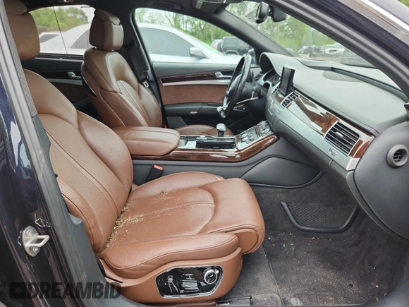 2015 Audi A8 4.0T with VIN WAUJ2AFD6FN011009, listed as a Copart auction lot 64173005 with 153,377 mi miles and Salvage title. Bid and sale history available at DreamBid. Image 7.
