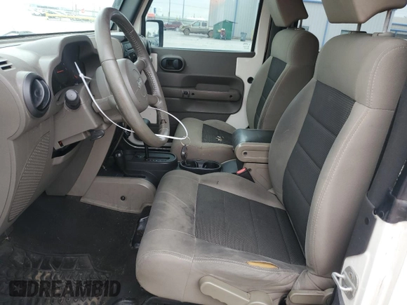 2009 Jeep Wrangler X with VIN 1J4FA24139L716919, listed as a Copart auction lot 54626855 with 211,943 mi miles and Clean Title. Bid and sale history available at DreamBid. Image 7.