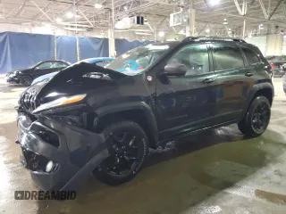 2015 Jeep Cherokee Trailhawk with VIN 1C4PJMBS5FW617448, listed as a Copart auction lot 48322345 with 159,843 mi miles and Clean Title. Bid and sale history available at carsss.com. Image 1.