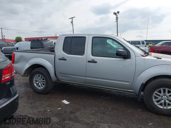 2017 Nissan Frontier SV with VIN 1N6AD0EV2HN750721, listed as a IAAI auction lot 42102310 with 79,205 mi miles and . Bid and sale history available at DreamBid. Image 13.