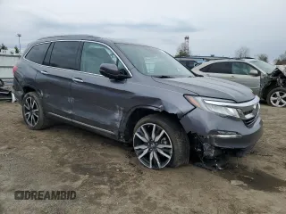 2020 Honda Pilot Touring 7-Passenger z VIN 5FNYF6H69LB005829, wystawiony jako Copart lot #52702555 z przebiegiem 90 746 mil mil oraz Szkoda całkowita • Salvage title. Historia ofert i sprzedaży dostępna na DreamBid. Obrazek 4.