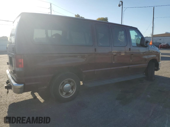 2010 Ford Econoline Passenger XL with VIN 1FMNE1BW6ADA87472, listed as a Copart auction lot 74989314 with 215,315 mi miles and Salvage Title. Bid and sale history available at DreamBid. Image 3.