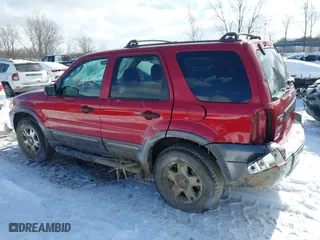 2005 Ford Escape XLT with VIN 1FMYU931X5KD99667, listed as a IAAI auction lot 41591057 with 69,595 mi miles. Bid and sale history available at carsss.com. Image 14.