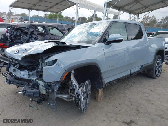 2023 Rivian R1T Adventure with VIN 7FCTGBAA9PN027894, listed as a IAAI auction lot 42061339 with 5,047 mi miles. Bid and sale history available at carsss.com. Image 24.