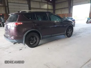 2016 Toyota RAV4 LE with VIN 2T3BFREV3GW430479, listed as a IAAI auction lot 40501022 with 126,835 mi miles. Bid and sale history available at carsss.com. Image 4.