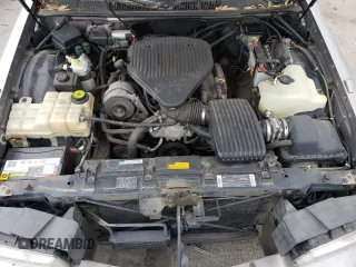 1995 Cadillac Fleetwood z VIN 1G6DW52P7SR707766, wystawiony jako Copart lot #88814915 z przebiegiem 140 958 mil mil oraz Tytuł czysty. Historia ofert i sprzedaży dostępna na DreamBid. Obrazek 12.