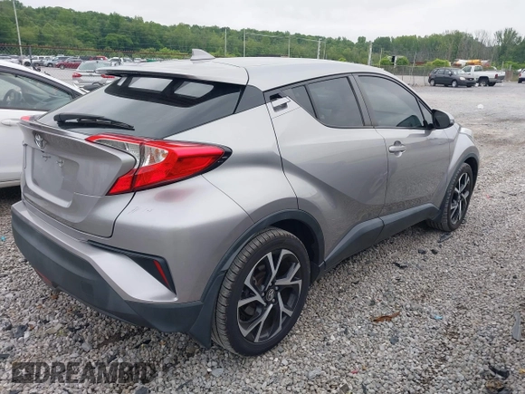 2018 Toyota C-HR XLE with VIN NMTKHMBXXJR031420, listed as a IAAI auction lot 42225490 with 80,628 mi miles and . Bid and sale history available at DreamBid. Image 4.
