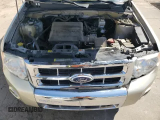 2010 Ford Escape Limited z VIN 1FMCU9EG5AKC49732, wystawiony jako Copart lot #61172415 z przebiegiem 148 796 mil mil oraz Szkoda całkowita • Salvage title. Historia ofert i sprzedaży dostępna na DreamBid. Obrazek 12.