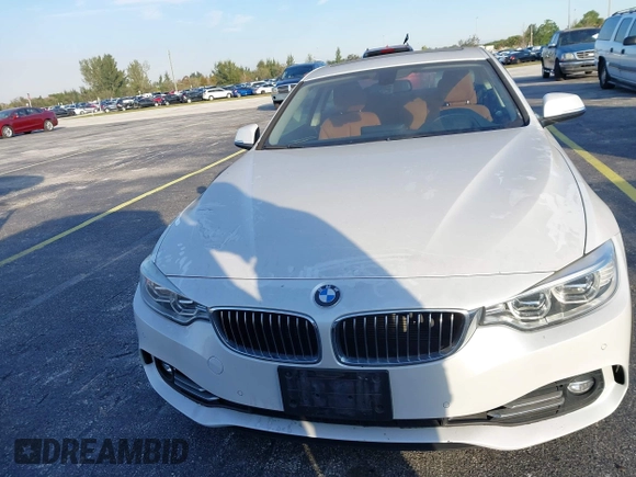 2014 BMW 4 Series 435i with VIN WBA3R1C51EK192795, listed as a IAAI auction lot 41263037 with 22,937 mi miles and . Bid and sale history available at DreamBid. Image 6.