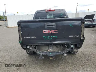 2020 GMC Canyon 4WD Denali with VIN 1GTG6EEN0L1243031, listed as a Copart auction lot 67939014 with 106,294 mi miles and Salvage Title. Bid and sale history available at carsss.com. Image 6.