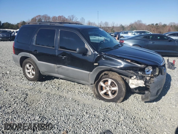 2005 Mazda Tribute i with VIN 4F2YZ02Z05KM38128, listed as a Copart auction lot 83175604 with 320,405 mi miles and Salvage Title. Bid and sale history available at carsss.com. Image 4.