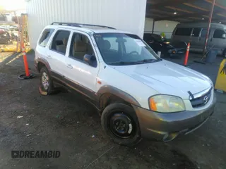 2003 Mazda Tribute LX with VIN 4F2YZ04153KM18168, listed as a IAAI auction lot 39240269 with 225,859 mi miles and . Bid and sale history available at carsss.com. Image 1.