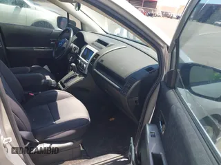 2009 Mazda 5 Sport with VIN JM1CR293990334438, listed as a IAAI auction lot 42561953 with 118,178 mi miles and . Bid and sale history available at DreamBid. Image 5.