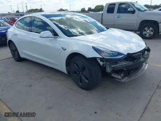 2019 Tesla Model 3 Mid Range with VIN 5YJ3E1EA0KF416799, listed as a IAAI auction lot 40662939 with 49,955 mi miles. Bid and sale history available at carsss.com. Image 1.
