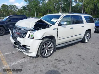 2015 GMC Yukon XL Denali with VIN 1GKS1JKJ0FR504266, listed as a IAAI auction lot 41564098 with 148,203 mi miles. Bid and sale history available at carsss.com. Image 17.