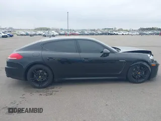 2015 Porsche Panamera 4 z VIN WP0AA2A7XFL001463, wystawiony jako IAAI lot #42139727 z przebiegiem 90 702 mil mil oraz . Historia ofert i sprzedaży dostępna na DreamBid. Obrazek 13.