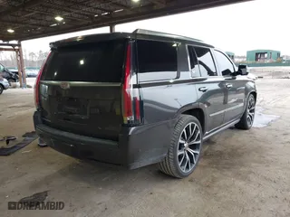 2017 Cadillac Escalade Premium Luxury with VIN 1GYS3CKJ0HR263565, listed as a IAAI auction lot 41615401 with 105,773 mi miles. Bid and sale history available at carsss.com. Image 4.