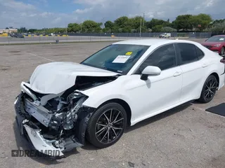 2022 Toyota Camry SE with VIN 4T1G11AK9NU659417, listed as a IAAI auction lot 41733094 with 74,054 mi miles. Bid and sale history available at carsss.com. Image 2.