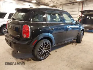 2012 MINI Countryman with VIN WMWZB3C53CWM05133, listed as a IAAI auction lot 41493309 with 114,412 mi miles and . Bid and sale history available at DreamBid. Image 4.