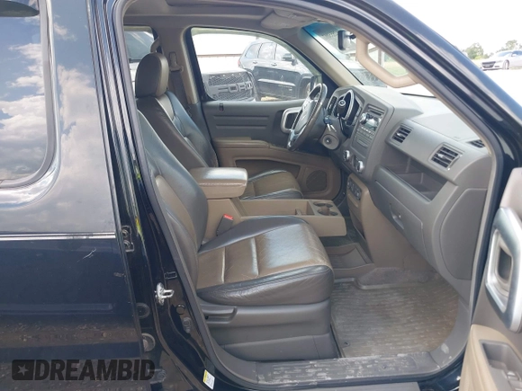 2006 Honda Ridgeline RTL with VIN 2HJYK165X6H558475, listed as a IAAI auction lot 42555097 with 180,711 mi miles and . Bid and sale history available at DreamBid. Image 5.