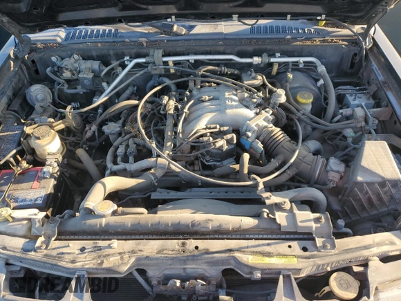 1999 Nissan Frontier XE with VIN 1N6ED26Y4XC322021, listed as a Copart auction lot 82690214 with 102,758 mi miles and Clean title. Bid and sale history available at DreamBid. Image 11.