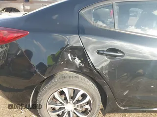 2015 Mazda 3 i SV with VIN JM1BM1T76F1262569, listed as a IAAI auction lot 41472375 with 89,932 mi miles. Bid and sale history available at carsss.com. Image 18.