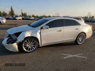 2014 Cadillac XTS Platinum z VIN 2G61T5S33E9206140, wystawiony jako Copart lot #80395874 z przebiegiem 162 074 mil mil oraz Szkoda całkowita • Salvage title. Historia ofert i sprzedaży dostępna na DreamBid. Obrazek 1.