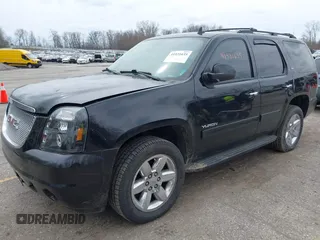2011 GMC Yukon SLT with VIN 1GKS2CE01BR347675, listed as a IAAI auction lot 41931635 with 247,817 mi miles. Bid and sale history available at carsss.com. Image 17.