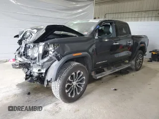 2024 GMC Canyon 4WD Denali with VIN 1GTP6FEK8R1310575, listed as a Copart auction lot 57334355 with 4,255 mi miles and Salvage title. Bid and sale history available at DreamBid. Image 1.