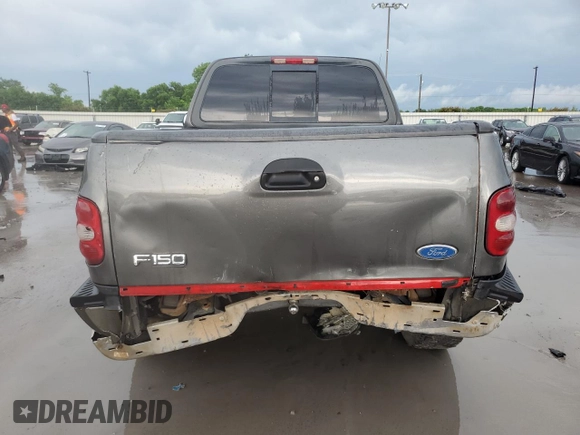 2003 Ford F-150 XL z VIN 1FTRF17263NA29013, wystawiony jako Copart lot #55668355 z przebiegiem 202 416 mil mil oraz Szkoda całkowita • Salvage title. Historia ofert i sprzedaży dostępna na DreamBid. Obrazek 6.