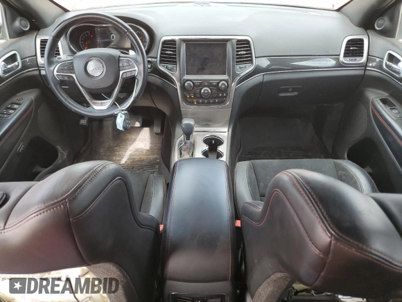 2018 Jeep Grand Cherokee Trailhawk with VIN 1C4RJFLGXJC477597, listed as a Copart auction lot 56338075 with 91,443 mi miles and Salvage title. Bid and sale history available at DreamBid. Image 8.