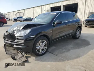 2012 Porsche Cayenne S Hybrid z VIN WP1AE2A26CLA92640, wystawiony jako Copart lot #48999075 z przebiegiem 129 931 mil mil oraz Szkody całkowita. Historia ofert i sprzedaży dostępna na DreamBid. Obrazek 1.