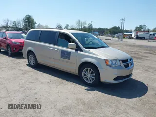 2016 Dodge Grand Caravan SXT with VIN 2C4RDGCGXGR151926, listed as a IAAI auction lot 41899225 with 69,456 mi miles. Bid and sale history available at carsss.com. Image 1.