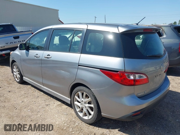 2012 Mazda Mazda5 Grand Touring with VIN JM1CW2DL2C0129518, listed as a IAAI auction lot 41872136 with 129,323 mi miles. Bid and sale history available at carsss.com. Image 3.