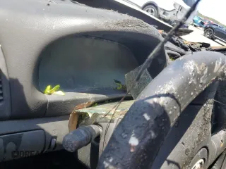 2004 Toyota Camry LE z VIN JTDBE32K740250691, wystawiony jako Copart lot #55793225 z przebiegiem Nie podano mil oraz Szkoda całkowita • Salvage title. Historia ofert i sprzedaży dostępna na DreamBid. Obrazek 9.