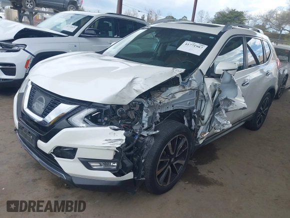 2017 Nissan Rogue SL with VIN JN8AT2MT7HW143035, listed as a IAAI auction lot 41771987 with 77,696 mi miles and . Bid and sale history available at DreamBid. Image 17.