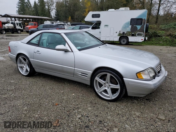 2001 Mercedes-Benz SL 500 with VIN WDBFA68F01F198112, listed as a Copart auction lot 77034114 with 114,049 mi miles and Salvage title. Bid and sale history available at DreamBid. Image 4.