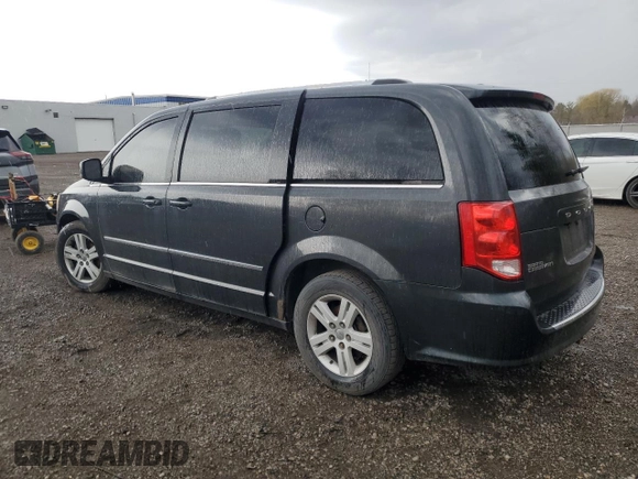 2011 Dodge Grand Caravan Crew with VIN 2D4RN5DG2BR762738, listed as a Copart auction lot 49528955 with 203,748 mi miles and Clean Title. Bid and sale history available at DreamBid. Image 2.