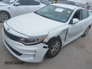 2016 Kia Optima LX with VIN KNAGT4L39G5104726, listed as a IAAI auction lot 40950914 with 128,728 mi miles. Bid and sale history available at carsss.com. Image 6.