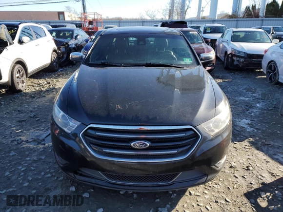 2014 Ford Taurus Limited z VIN 1FAHP2J8XEG170806, wystawiony jako Copart lot #84871394 z przebiegiem 170 124 mil mil oraz Czysty tytuł • Clean title. Historia ofert i sprzedaży dostępna na DreamBid. Obrazek 5.