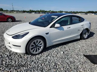 2021 Tesla Model 3 Standard Range Plus z VIN 5YJ3E1EA1MF047177, wystawiony jako Copart lot #59293145 z przebiegiem Nie podano mil oraz Szkoda całkowita • Salvage title. Historia ofert i sprzedaży dostępna na DreamBid. Obrazek 1.