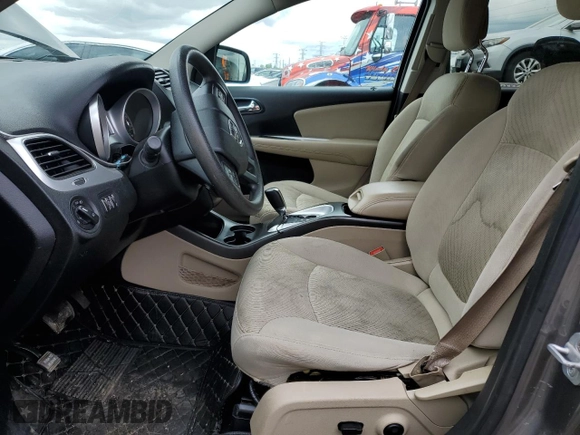 2012 Dodge Journey SXT z VIN 3C4PDCBG3CT213515, wystawiony jako Copart lot #58128845 z przebiegiem 208 152 mil mil oraz Szkoda całkowita • Salvage title. Historia ofert i sprzedaży dostępna na DreamBid. Obrazek 7.