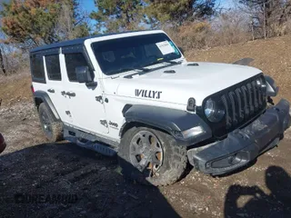 2022 Jeep Wrangler Unlimited Willys Sport with VIN 1C4HJXDN8NW267826, listed as a IAAI auction lot 41513056 with 34,716 mi miles and . Bid and sale history available at DreamBid. Image 1.