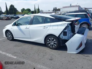 2021 Toyota Prius LE with VIN JTDKAMFP7M3197111, listed as a IAAI auction lot 42031569 with 240,098 mi miles and . Bid and sale history available at DreamBid. Image 15.